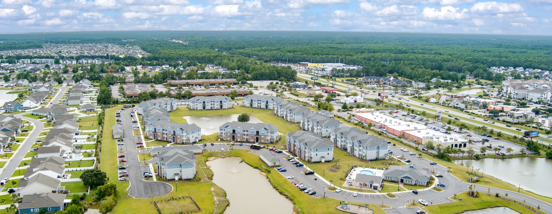 aerial view of a city and Sunscapes Apartments