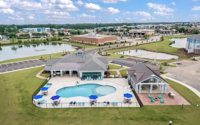 a pool with a building in the background