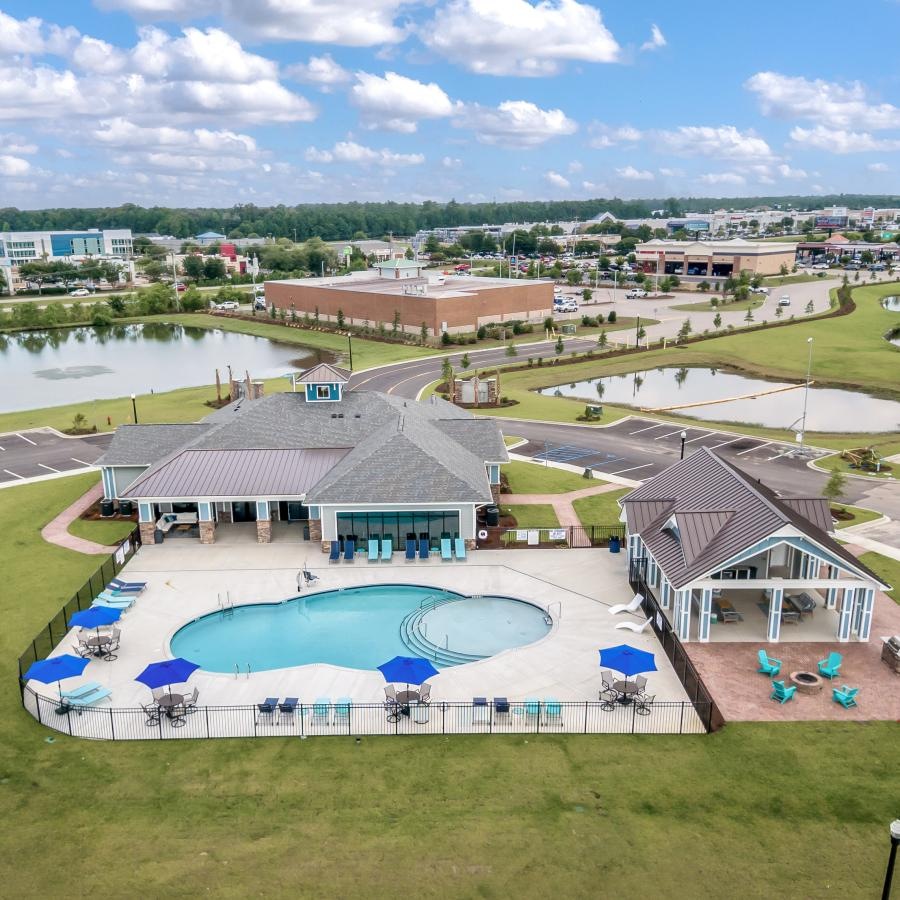 a pool with a building in the background