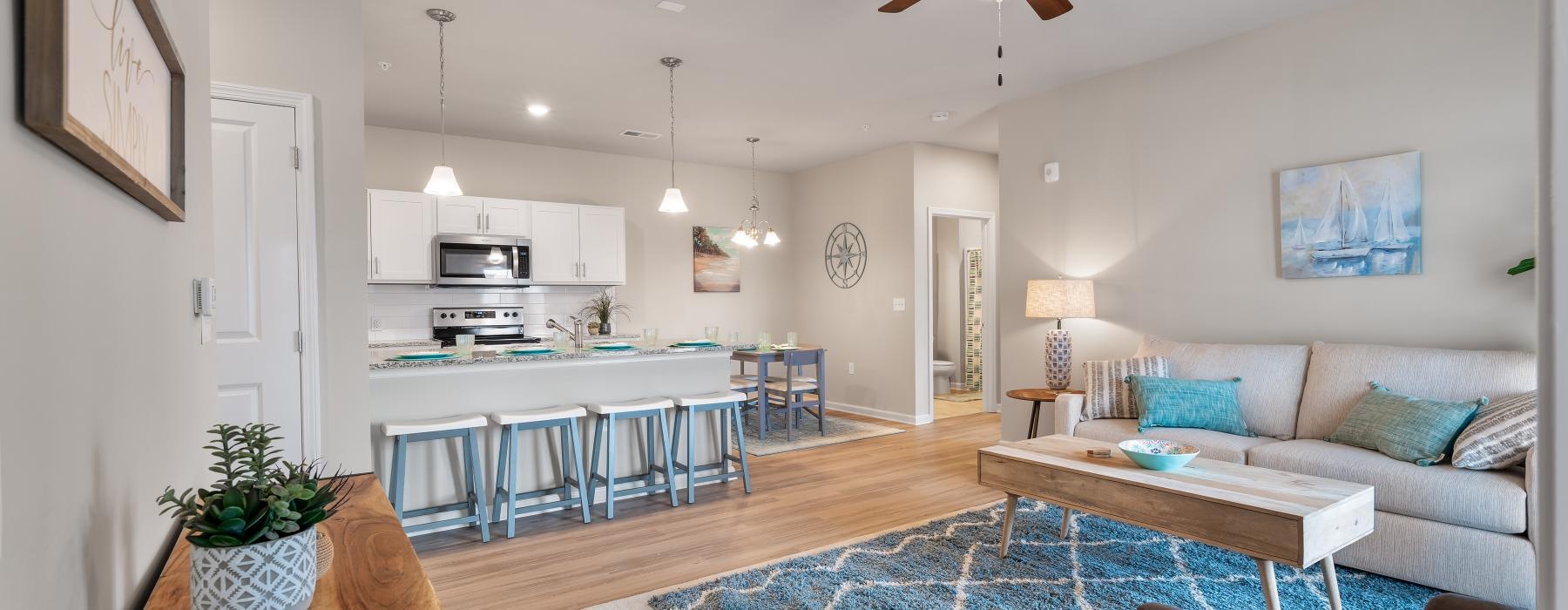 a living room with a bar and a table