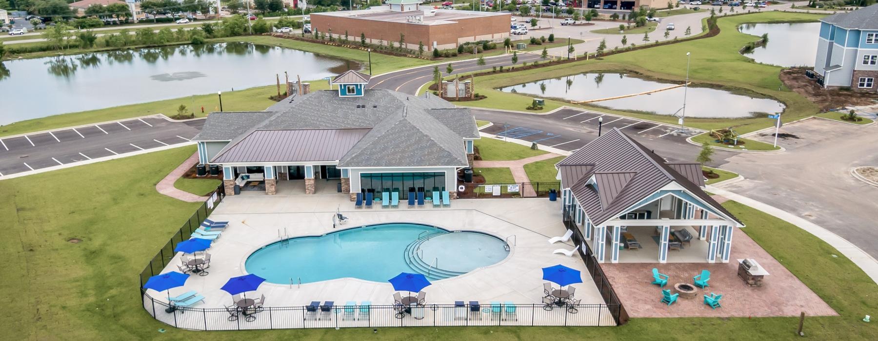 a pool with a building in the background